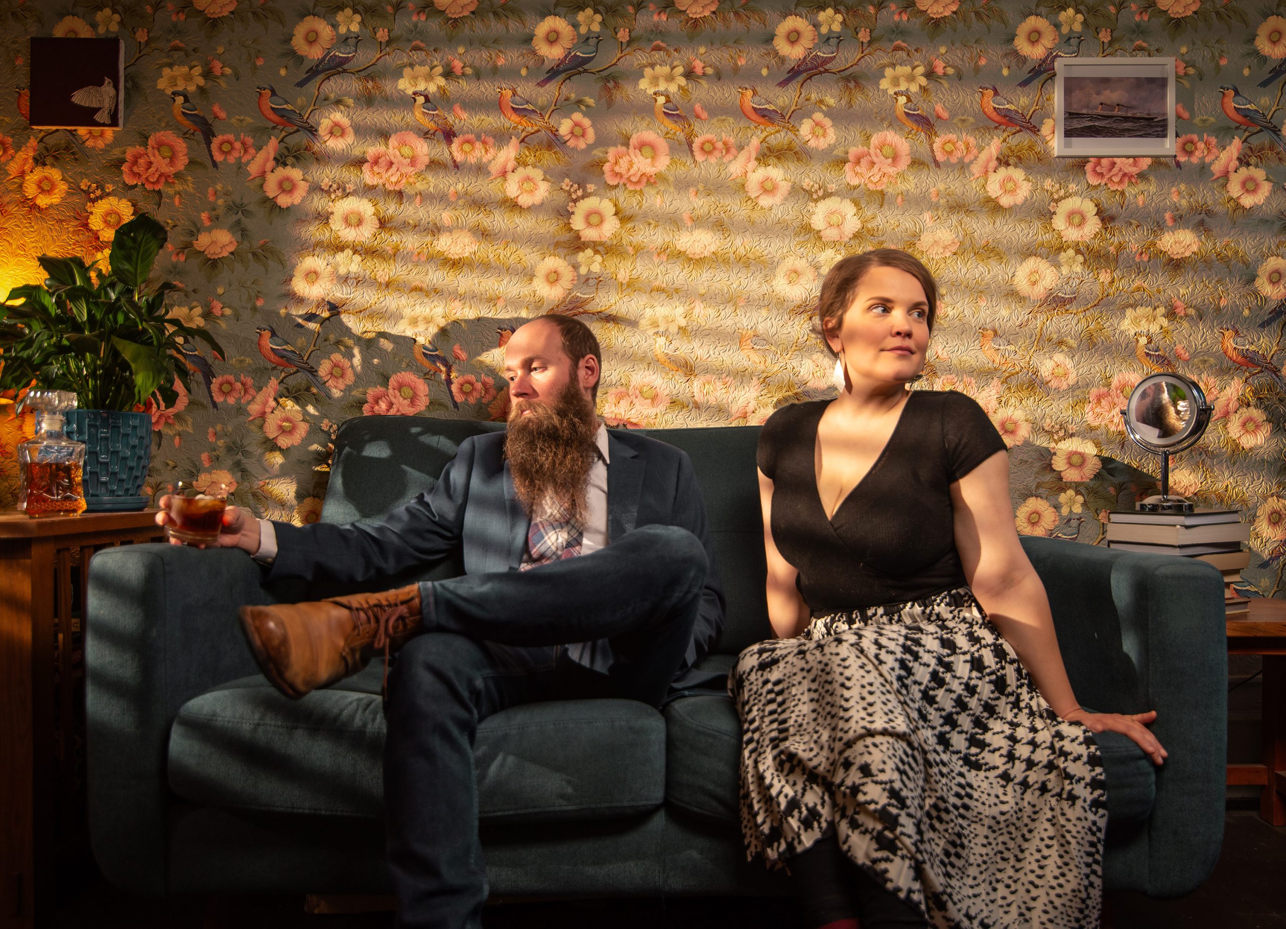 Portrait of two musicians on a couch