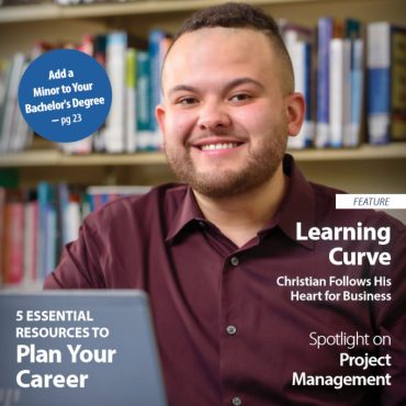 Magazine cover featuring a portrait of a student smiling in a library setting